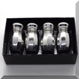 S56. Set of 4 silverplated Empire Pewter salt shakers in box 1.5”h - $18 